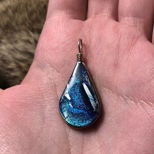 Stunning reversible blue and black dichroic glass tear drop pendant